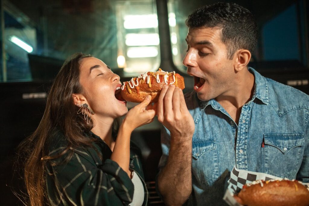 Couple eating a Delicious Sandwich 